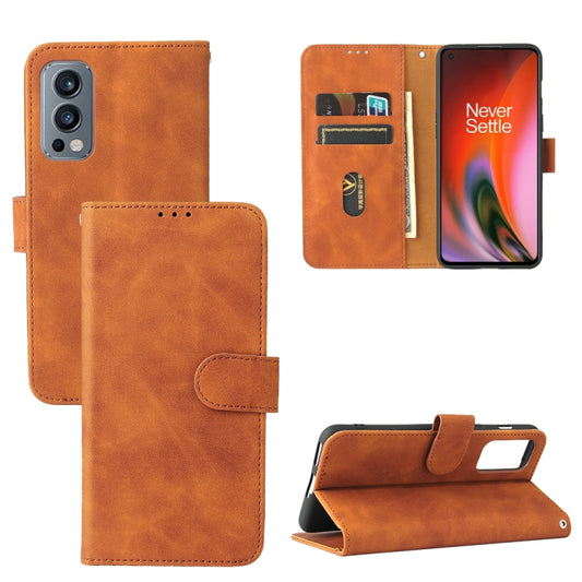 For OnePlus Nord 2 5G Solid Color Skin Feel Magnetic Buckle Horizontal Flip Calf Texture PU Leather Case with Holder & Card Slots & Wallet(Brown) - OnePlus Cases by buy2fix | Online Shopping UK | buy2fix